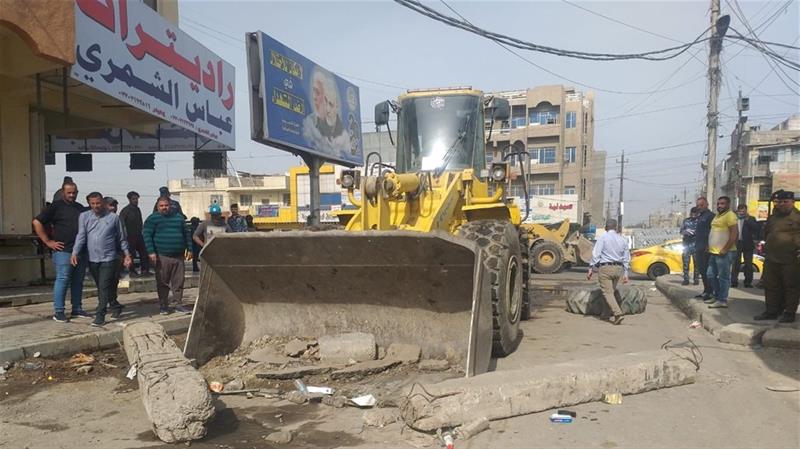 بالصور.. فتح عدد من الطرق والازقة المغلقة ورفع سيطرتين بجانبي الكرخ والرصافة